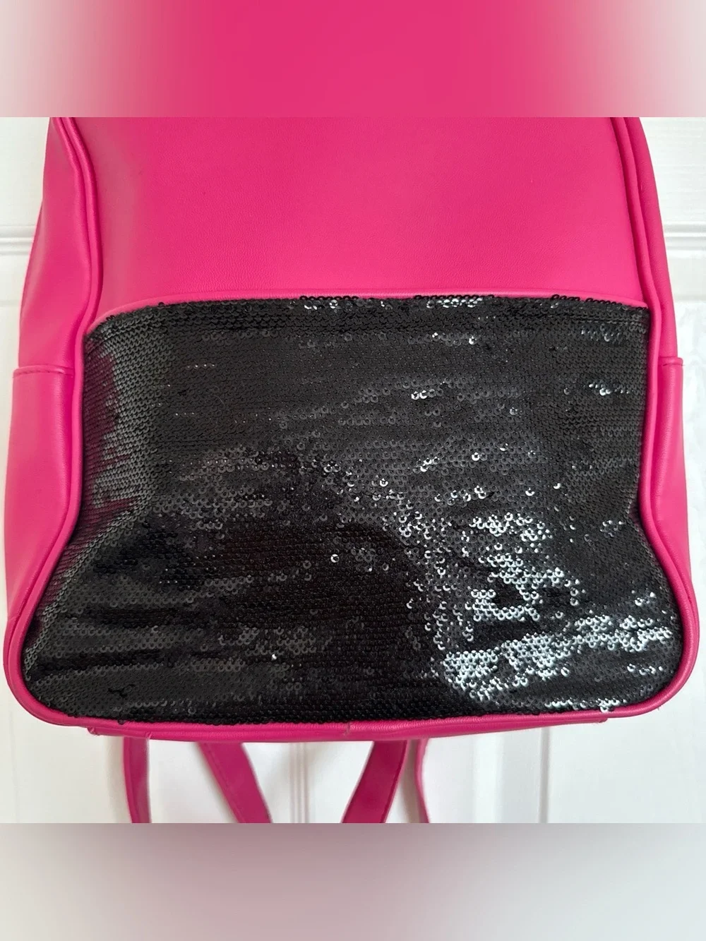 Women's Juicy Couture Hot Pink and Black Sequin backpack with gold detailing.